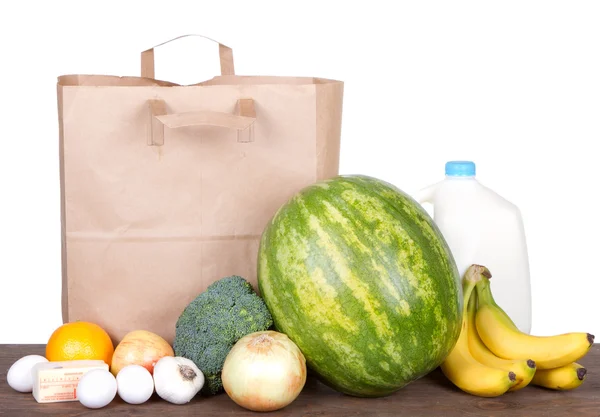 Contents of a brown paper shopping bag — Stock Photo, Image