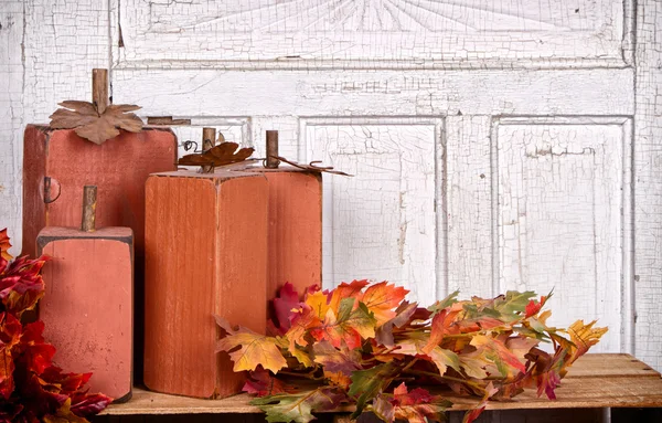 Wooden pumpkins autumn still life — Stockfoto