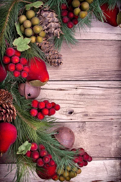 Christmas decorative fruit on wood — Stock Photo, Image