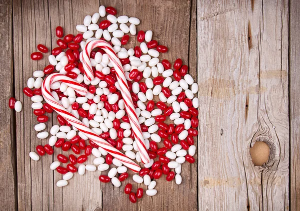 Christmas candy on wooden background — Stock Photo, Image