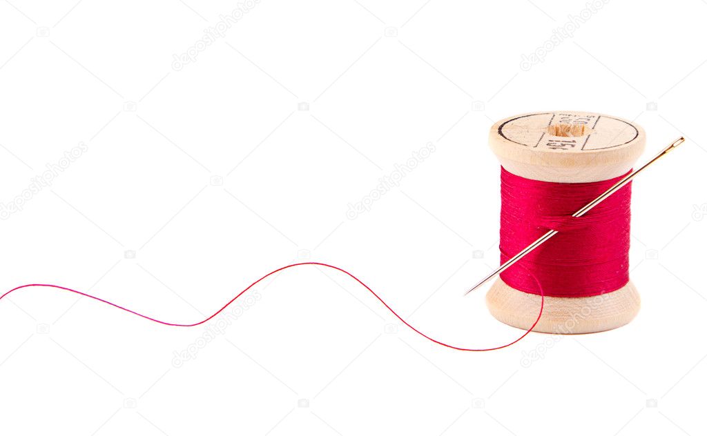 Sewing thread and needle Stock Photo by ©sjhuls 17437145