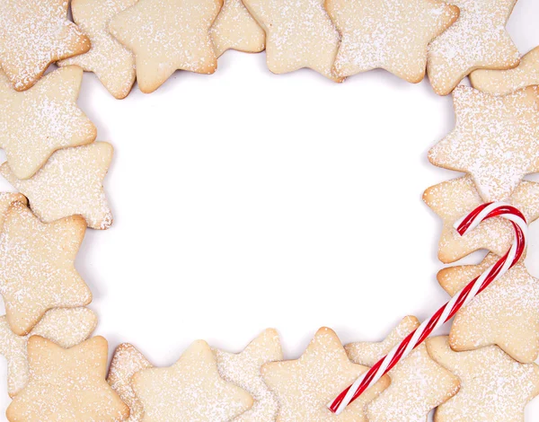 Galletas de Navidad estrella y bastones de caramelo —  Fotos de Stock