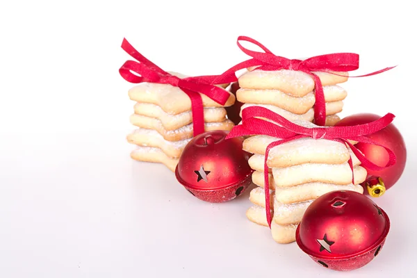 Christmas cookies stacked with ornaments — Stock Photo, Image
