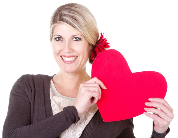 Mujer sosteniendo el corazón — Foto de Stock