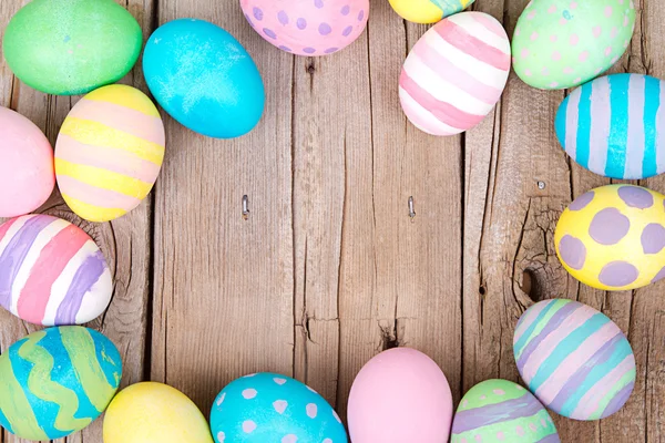 Easter eggs on a wooden background — Stock Photo, Image