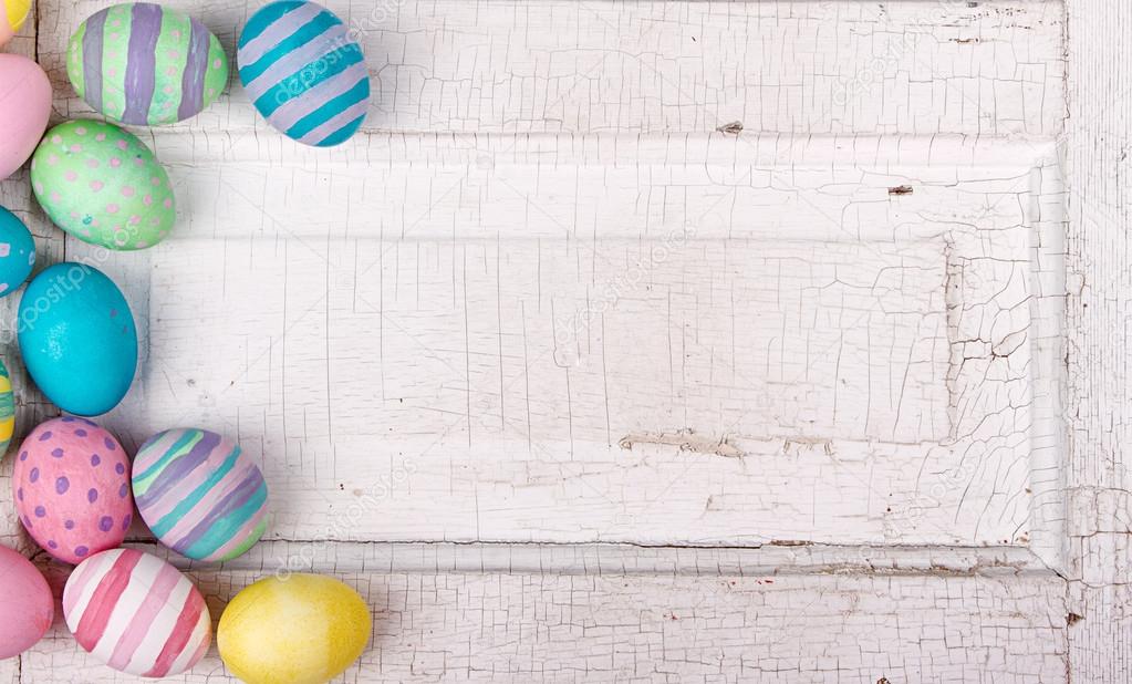 Easter eggs on a cracked antique background