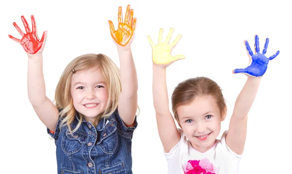 Two girls with paint on hands — Stock Photo, Image