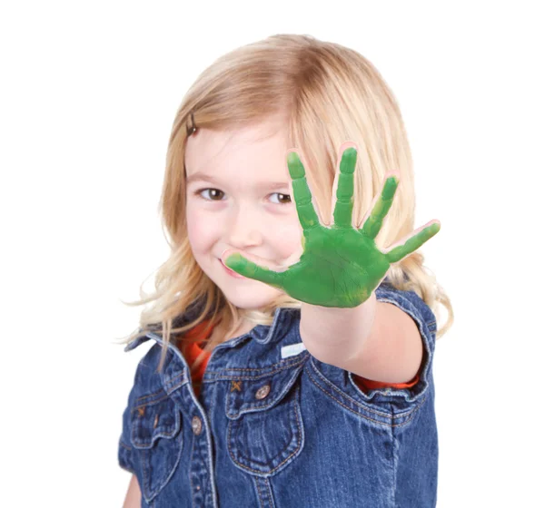 Uma criança com tinta verde na mão — Fotografia de Stock