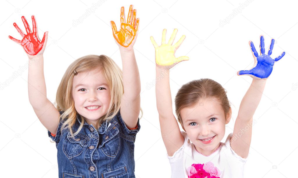 Two girls with paint on hands