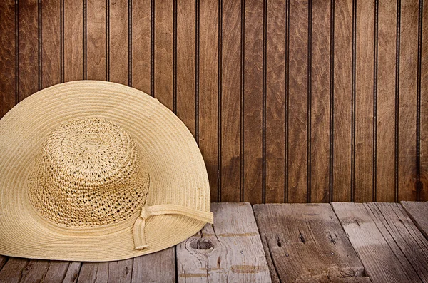 Sun hat on wooden background — Stock Photo, Image