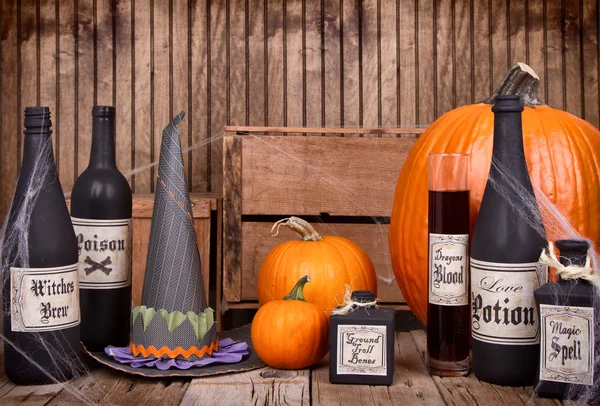 Potion bottles with witches hat — Stock Photo, Image