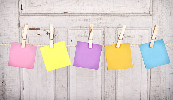 sticky notes on a clothes line