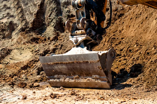 Close-up of excavator in stand by on construction site Stock Image