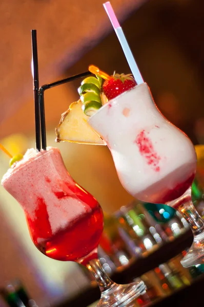 Soft and long drinks served in a nightclub isolated on bar background