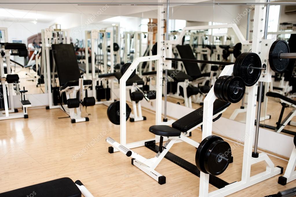 new modern gym and fitness club with sport equipment