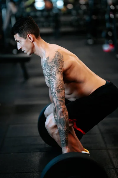 Profesyonel Atlet Bacak Egzersizi Sırasında Halter Kullanıyor — Stok fotoğraf