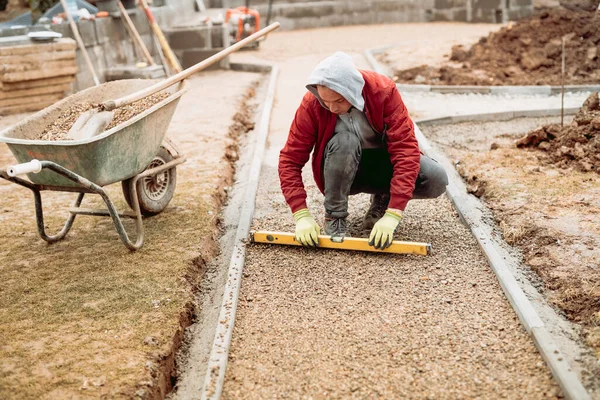 Construction Worker Installing Laying Pavement Stones Terrace Road Sidewalk Worker — Stock Photo, Image