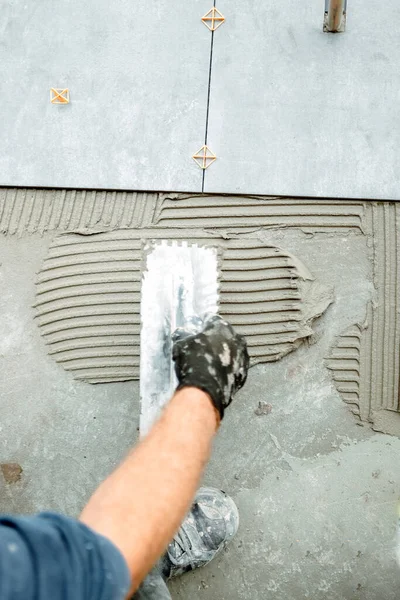 Close Worker Hand Plastering Adding Adhesive Comb Trowel — Stock Fotó