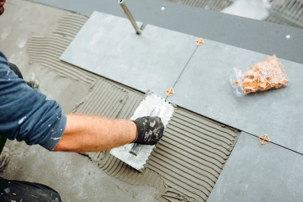 Hand Professional Construction Worker Tiler Laying Adhesive Placing Ceramic Tiles — Stock Photo, Image