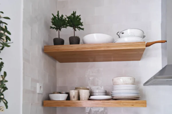 Blurred Wooden Kitchen Shelves Tableware White Brick Tile Wall Scandinavian — Zdjęcie stockowe