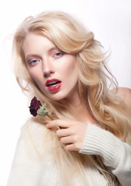 Beautiful sexy young female blonde with red flower — Stock Photo, Image