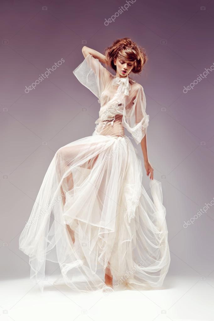 Romantic natural beauty. Fashion woman dancing