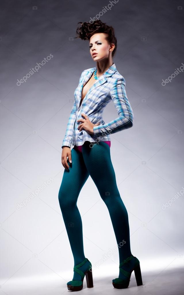 Fashion trendy lady in elegant pose - beauty modern style