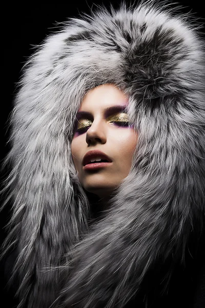 Beautiful young sensual woman in fur fashion collar Stock Photo