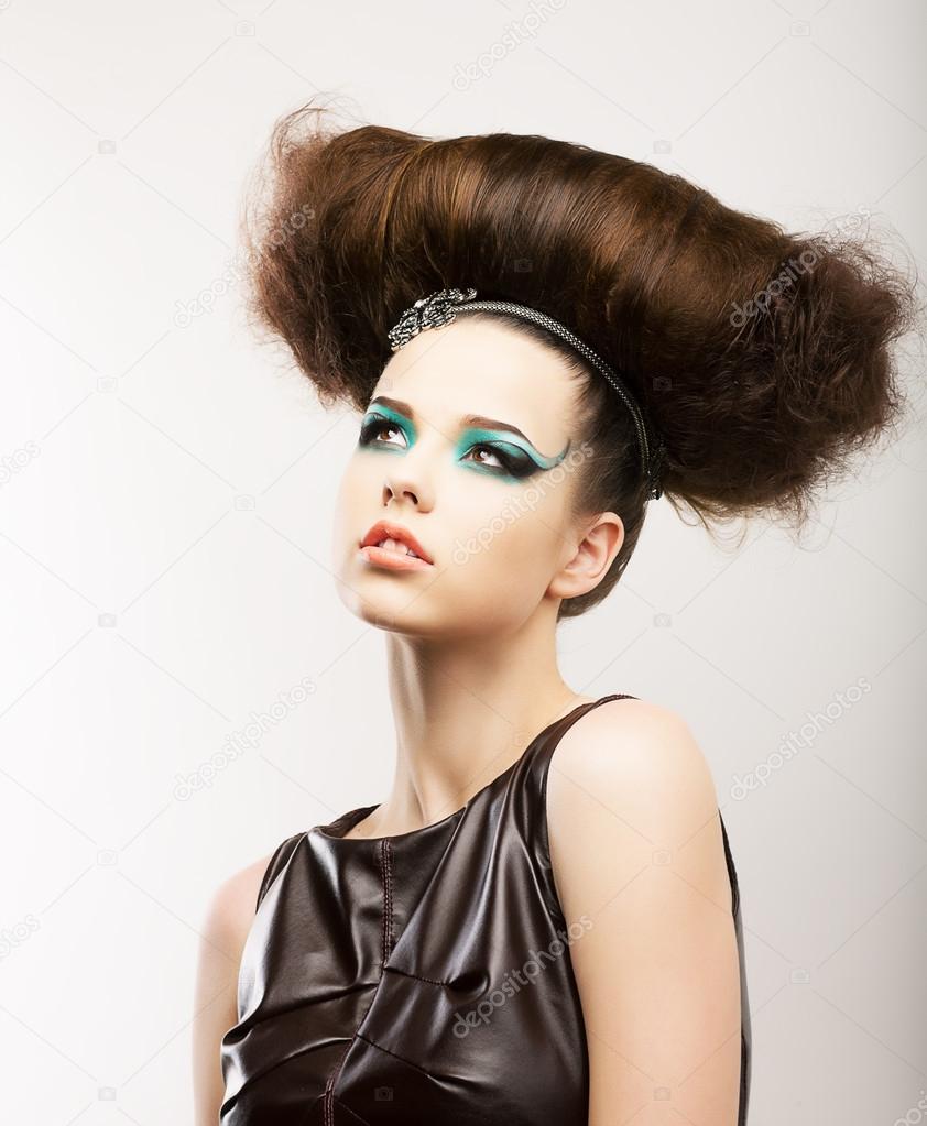 Fetish. Artistic Expressive Brunette with Frizzy Hairstyle. Creative Styling