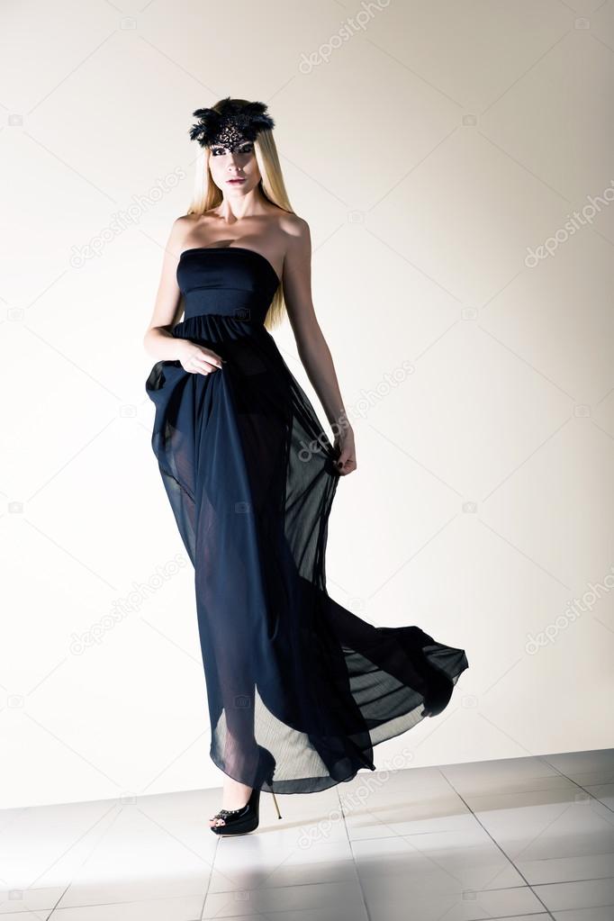 Sensuality. Stylish Dynamic Woman in Black Transparent Frock. Elagance