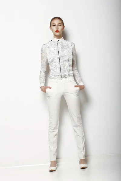 High Fashion. Trendy Woman in WHite Breeches in Graceful Pose. Spring Time Collection — Stock Photo, Image