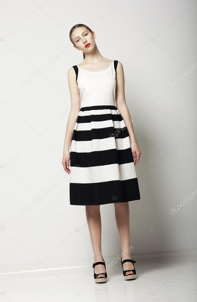Elegant Woman Fashion Model in Light Striped Cotton Sundress. Vogue Style