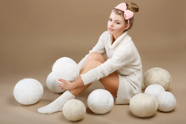 Crochet. Beautiful Needlewoman Sitting with Pile of White Skeins of Yarn. Needlecraft — Stock Photo, Image