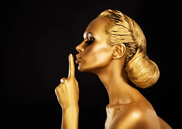 Segretezza. Bodyart. Donna d'oro che mostra il segno del silenzio. Zitto! ! — Foto Stock