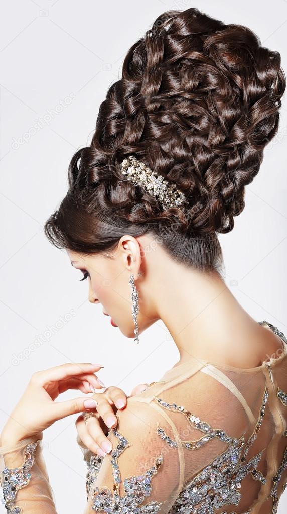 Luxury. Fashion Model with Trendy Updo - Braided Tress. Vogue Style
