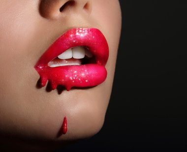 Art. Sensual Smeared Woman's Red Lips with Sparkles clipart