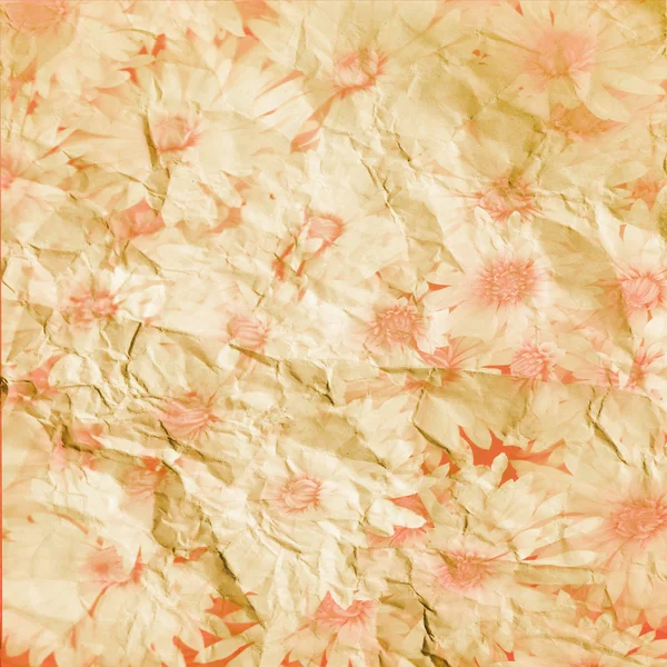 Ljust rosa blommor på söndersmulad papper — Stockfoto