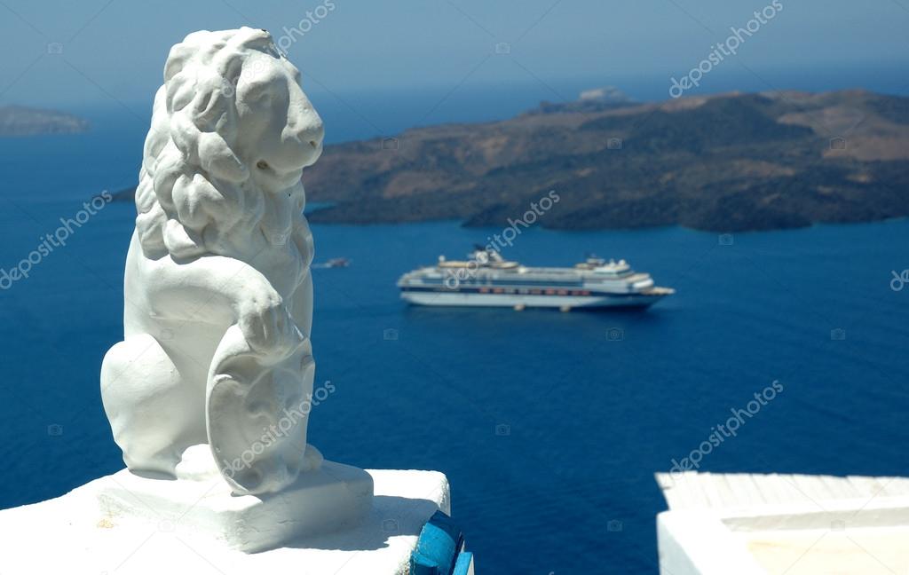 Statue and cruise ship at Santorini