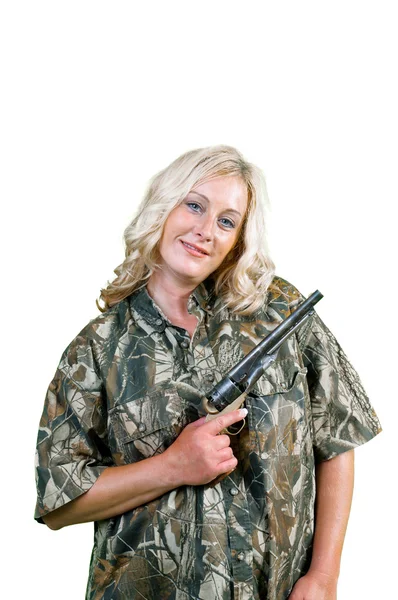 Mujer sonriente con revólver en polvo negro —  Fotos de Stock