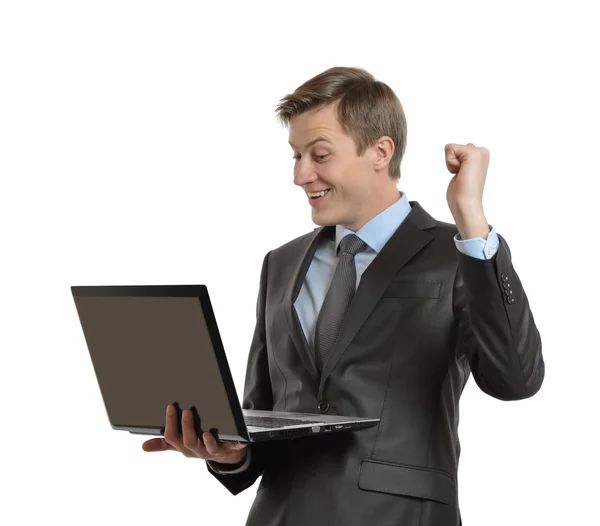 Succesvolle zakenman met laptop — Stockfoto