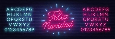 Feliz Navidad neon mesajı. Duvarın arkasındaki tebrik kartı.