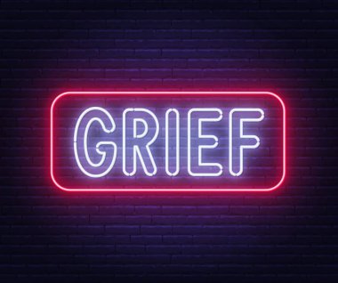 Neon sign Grief on brick wall background.