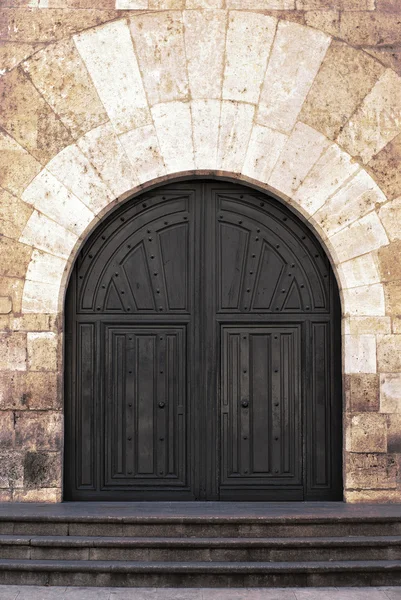 Old ornate wooden doors in Valladolid, Spain. — Stock Photo, Image