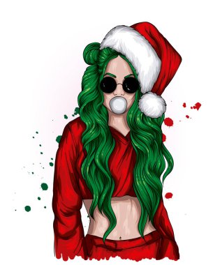 Noel şapkalı ve şık elbiseli güzel bir kız. Moda, tarz, giysi ve aksesuarlar. Yeni Yıl ve Noel. 