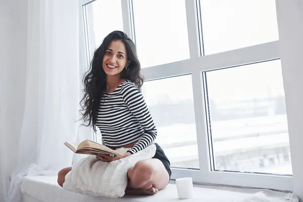 Smiling Portrait Girl Reading Book While Sitting Windowsill Having Free — Stock Photo, Image