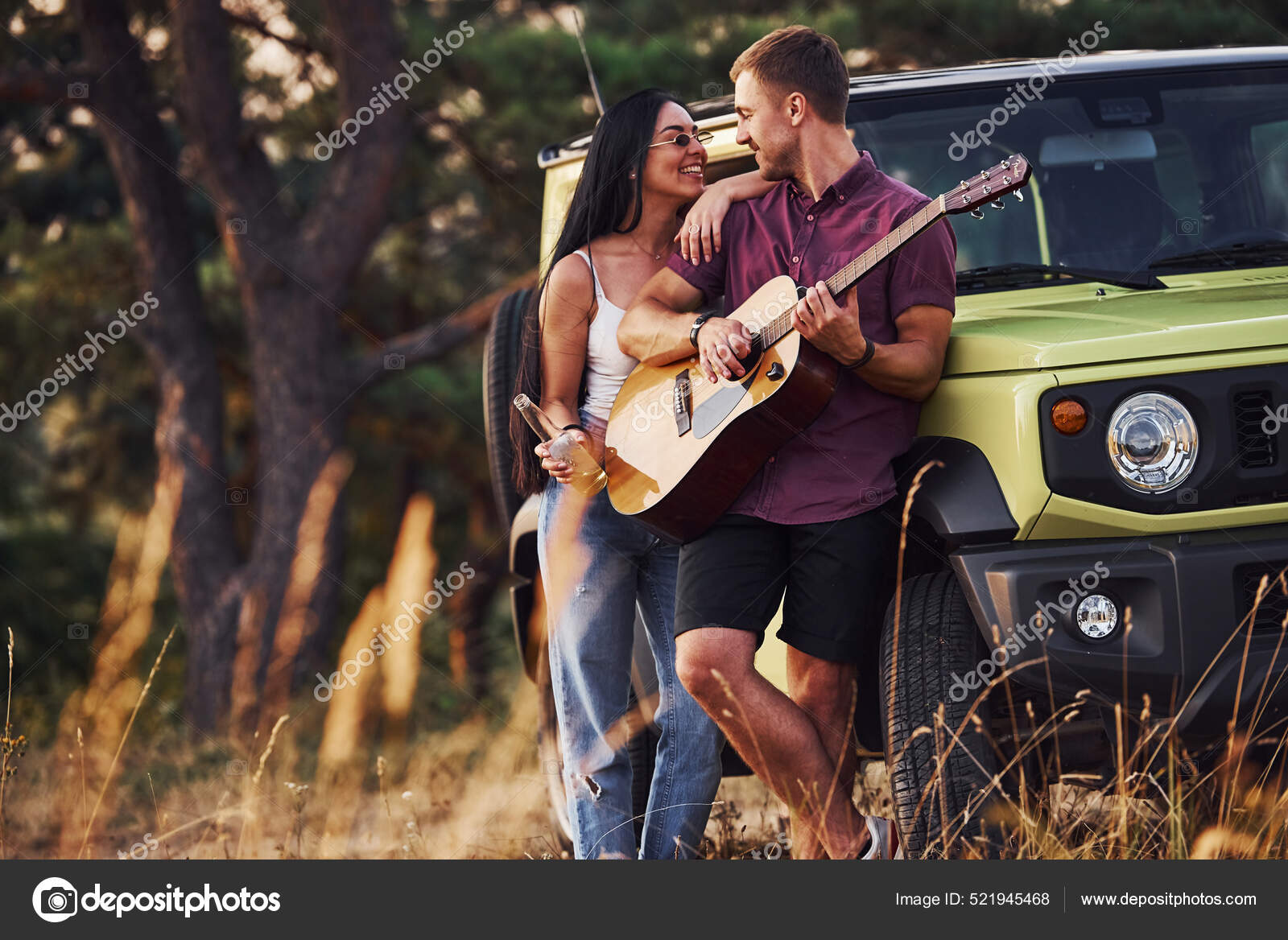 Free Photo | Couple in love with playing guitar at nature