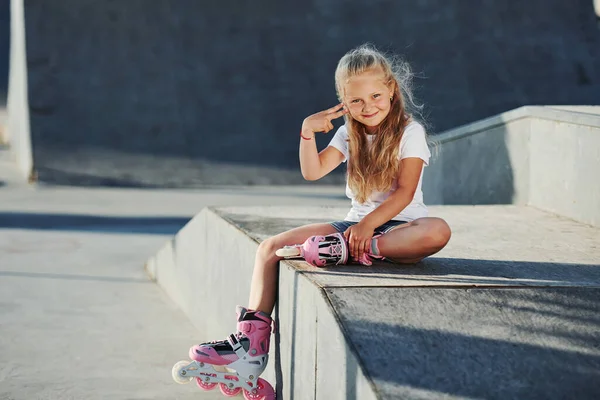Cute Little Girl Roller Skates Outdoors Sits Ramp Extreme Sports — Stock Photo, Image