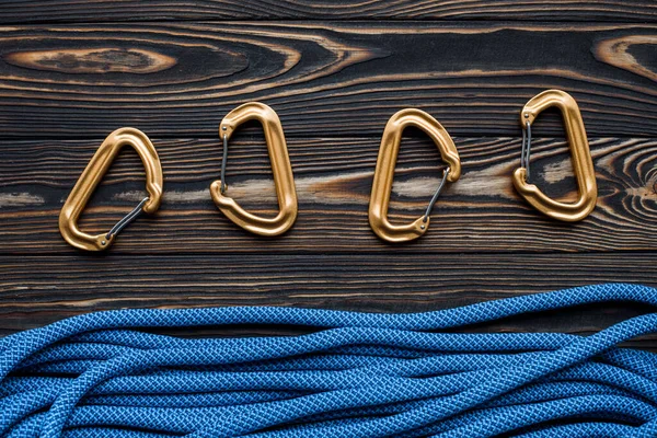 Mountaineering Isolated Photo Climbing Equipment Part Carabiner Lying Wooden Table — Stock Photo, Image