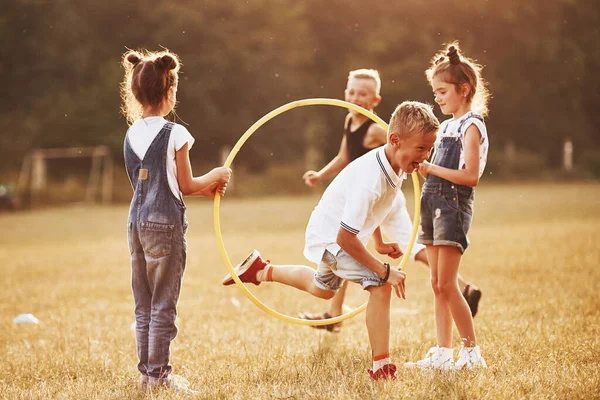 Jumping Circle Fitness Tool Kids Having Fun Field — Stock Photo, Image