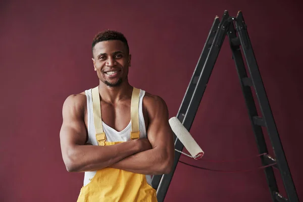 Standing Arms Crossed Young African American Worker Yellow Uniform Have — Stock Photo, Image